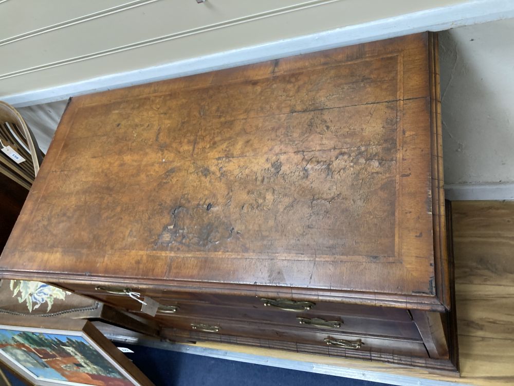 A George II style featherbanded walnut chest, width 98cm depth 52cm height 84cm